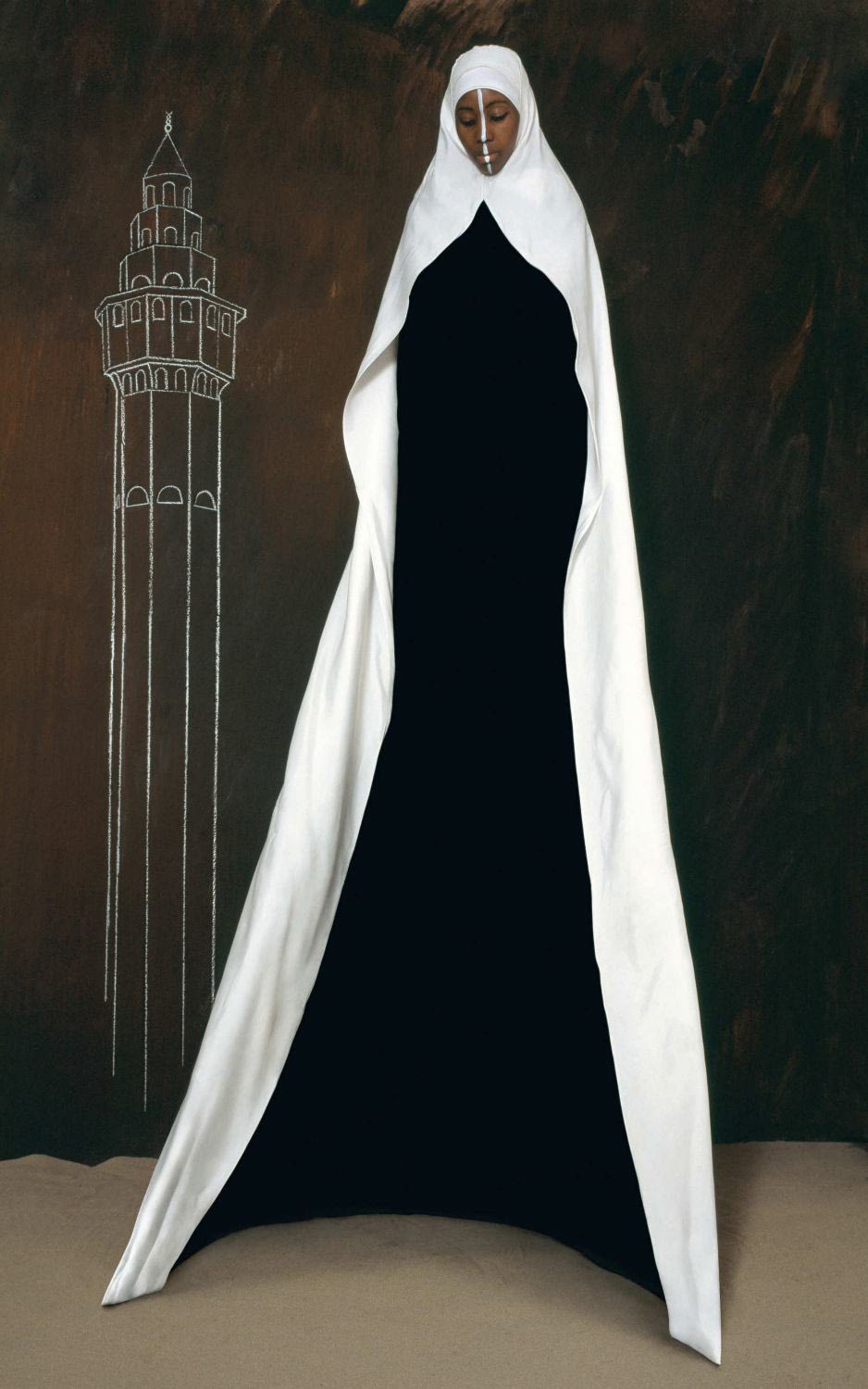 A painting of a robed figure in black and white against a dark tower, by Maïmouna Guerresi