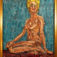 Mosaic-style painting of a seated golden figure against a blue mosaic background
