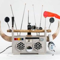 Sculptural boombox-style artwork with mounted horns, speakers and antennas