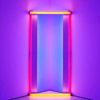 Neon light installation forming a glowing purple, pink and blue archway